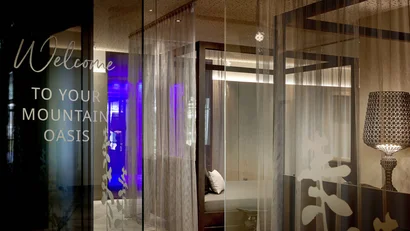 Modern cozy hotel lobby with curtains and ambient lighting