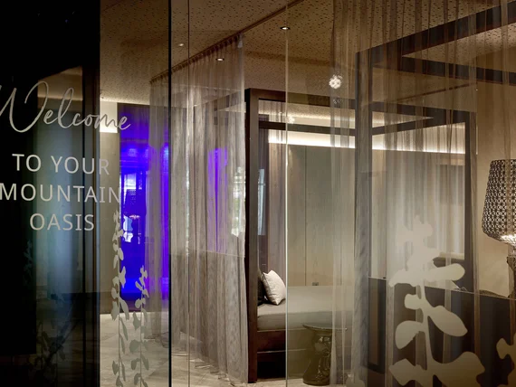 Modern cozy hotel lobby with curtains and ambient lighting